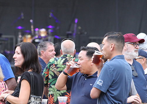 festival goers enjoying beers