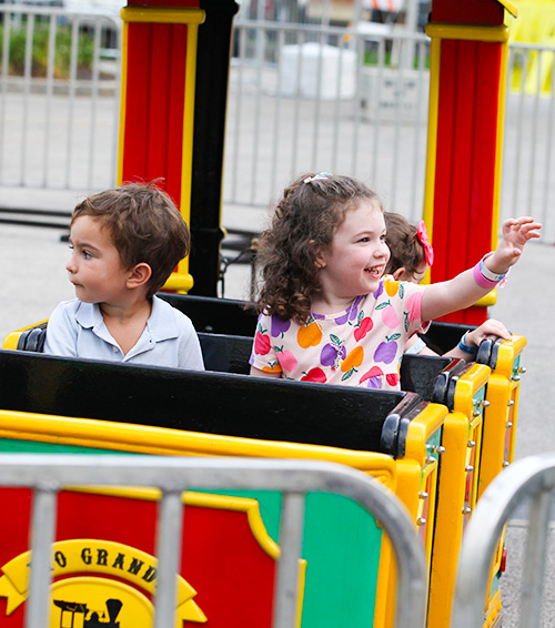 kids on carnival ride